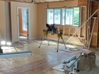 Wall removed and Large Open Space created. Floors being patched. Wall removed and Large Open Space created. Floors being patched.