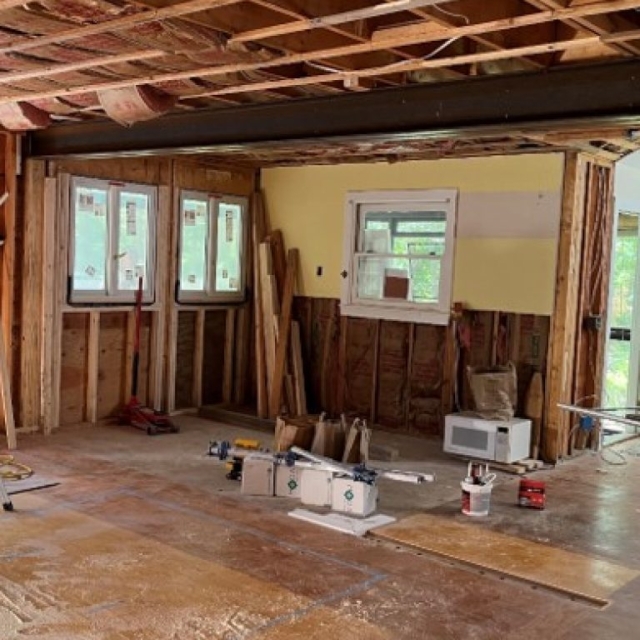 Temporary Wall removed and 900 lb./ 23’ Structural Beam Installed