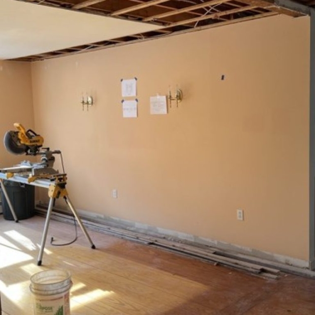 Wall dividing original Large Dining Room and Tiny Galley Kitchen behind the Wall (See Kitchen Cabinets at Right Edge of Wall)